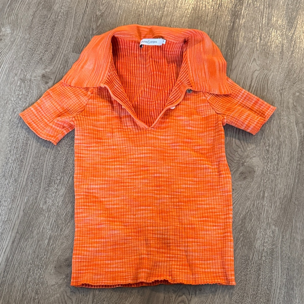 Orange collared polo shirt